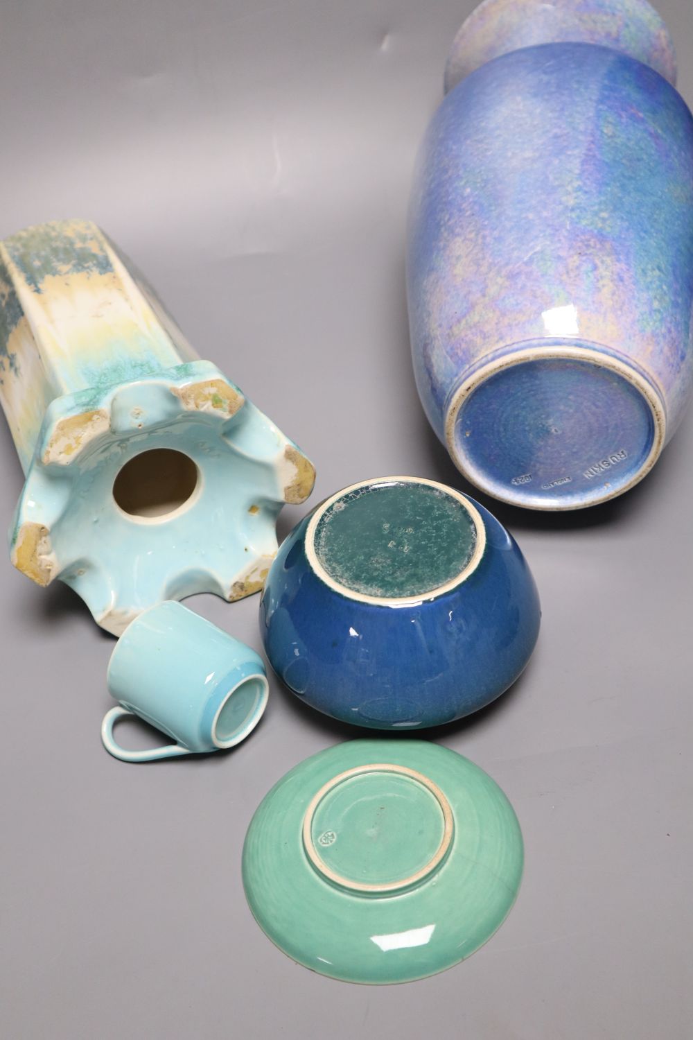 A collection of Ruskin pottery, including a blue lustre vase,